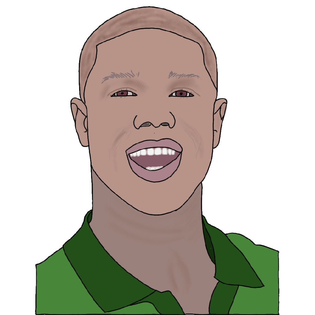 A laughing black man with brown eyes in a green collared shirt.